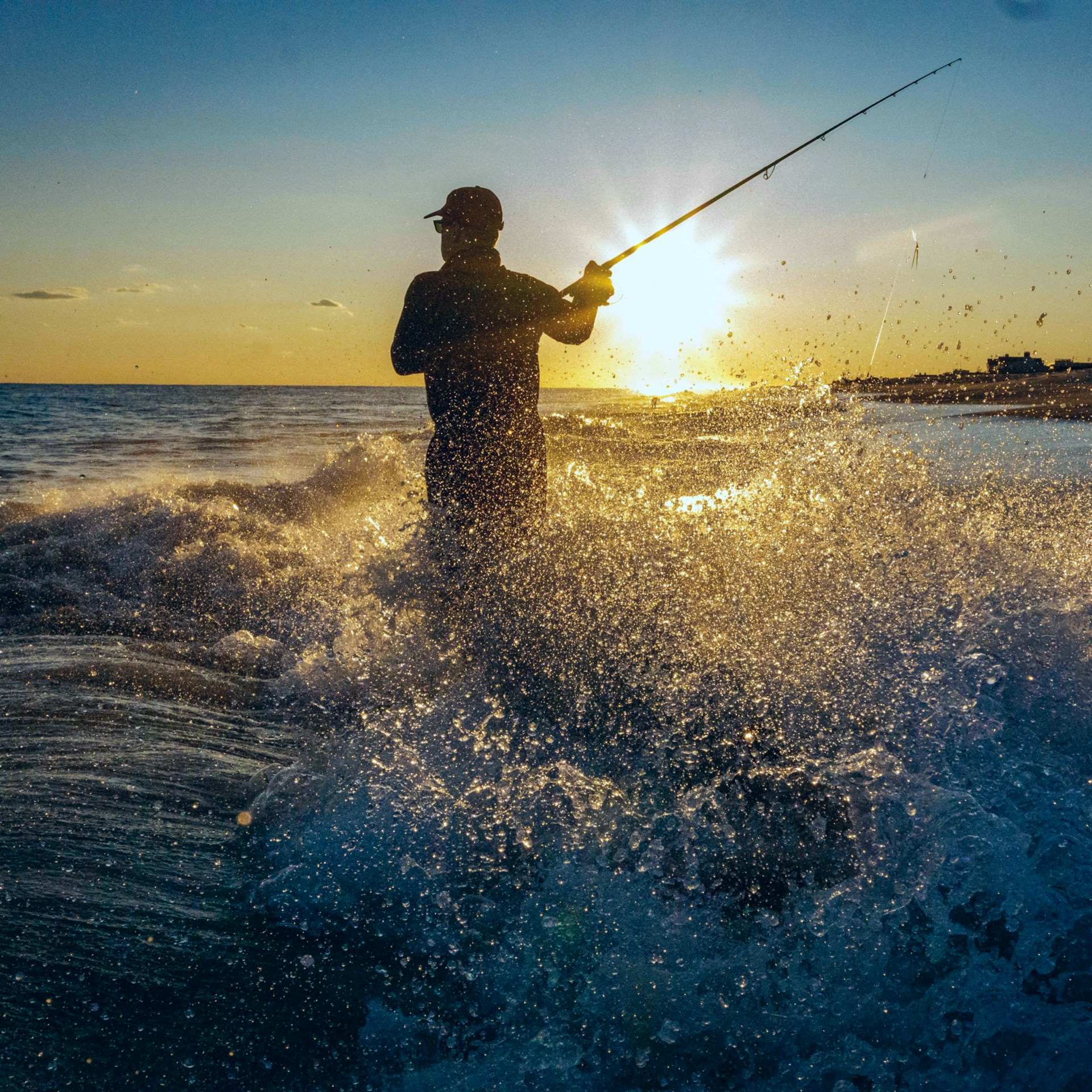 Fishing in the Middle of Sunrise in Nusa Dua Bali
